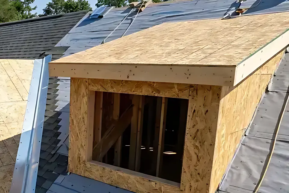 Step 1: Inspect dormer structural rafter framing, OSB sheathing, and window rough openings.